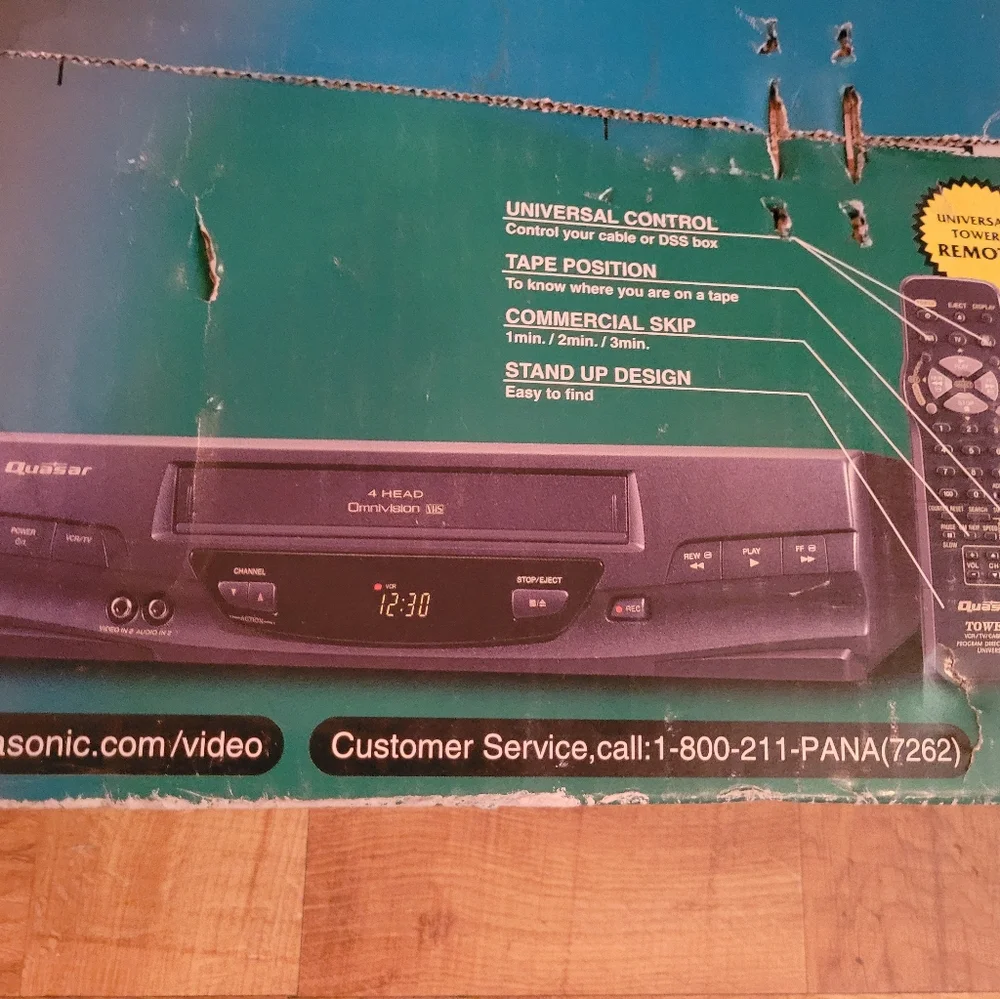NEW QUASAR 4 HEAD VCR CASSETTE RECORDER IN THE ORIGINAL BOX.